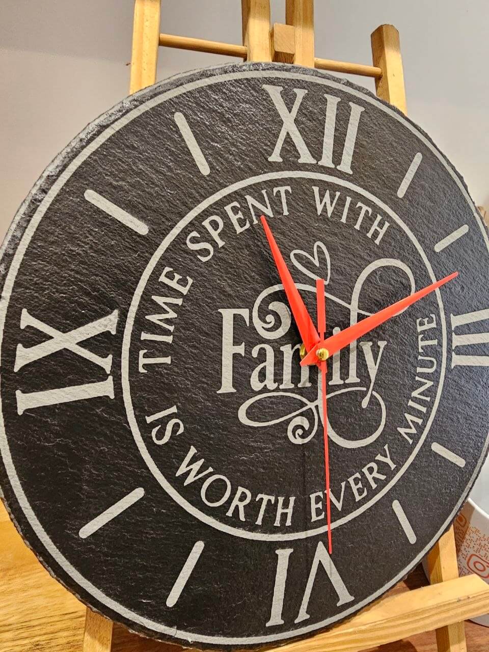 Family Time Engraved Round Slate Clock showcasing a heartfelt quote about family in elegant design.