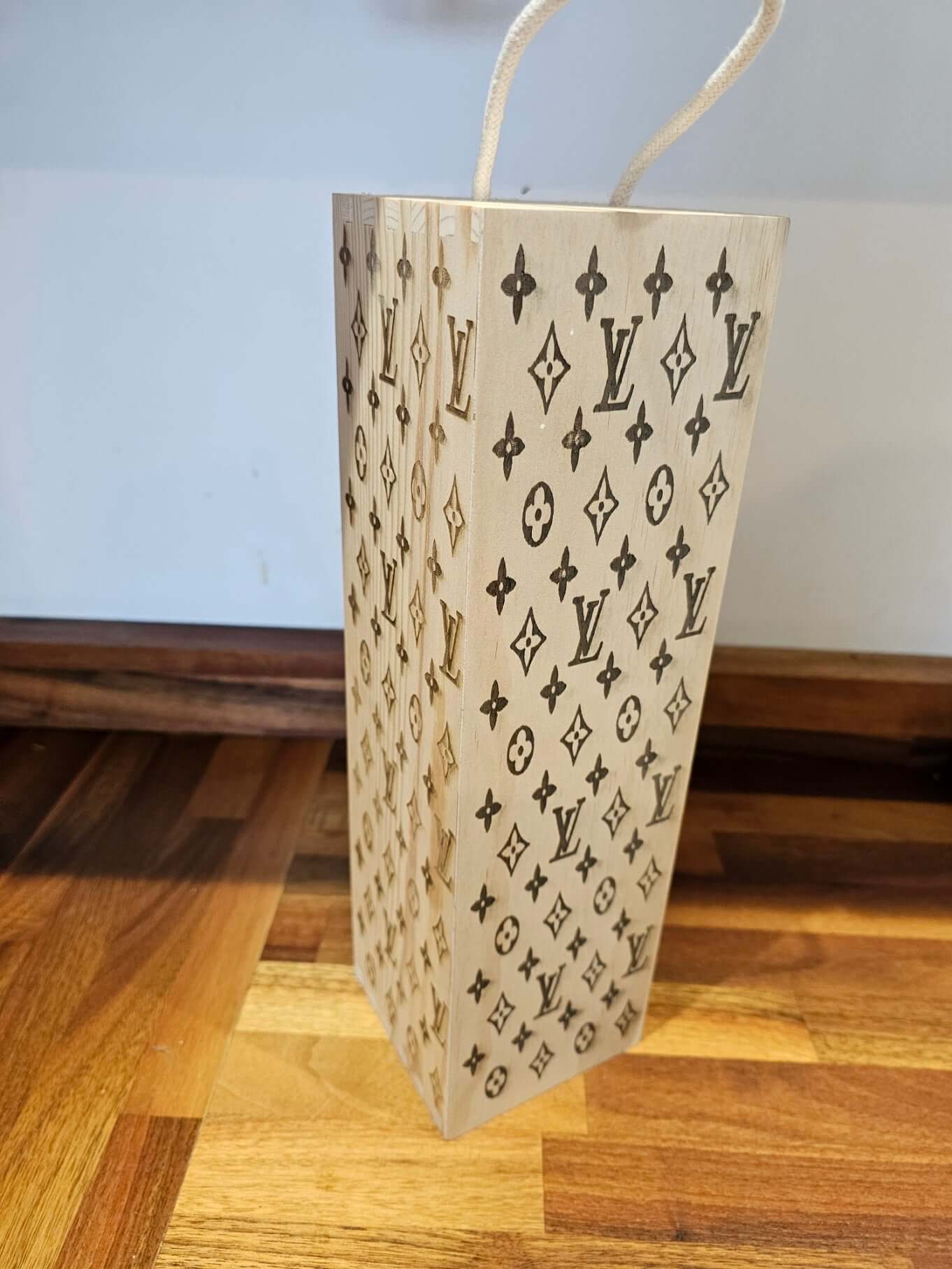 Engraved Wooden Wine Bottle Gift Box featuring Louis Vuitton pattern design and a stylish handle.