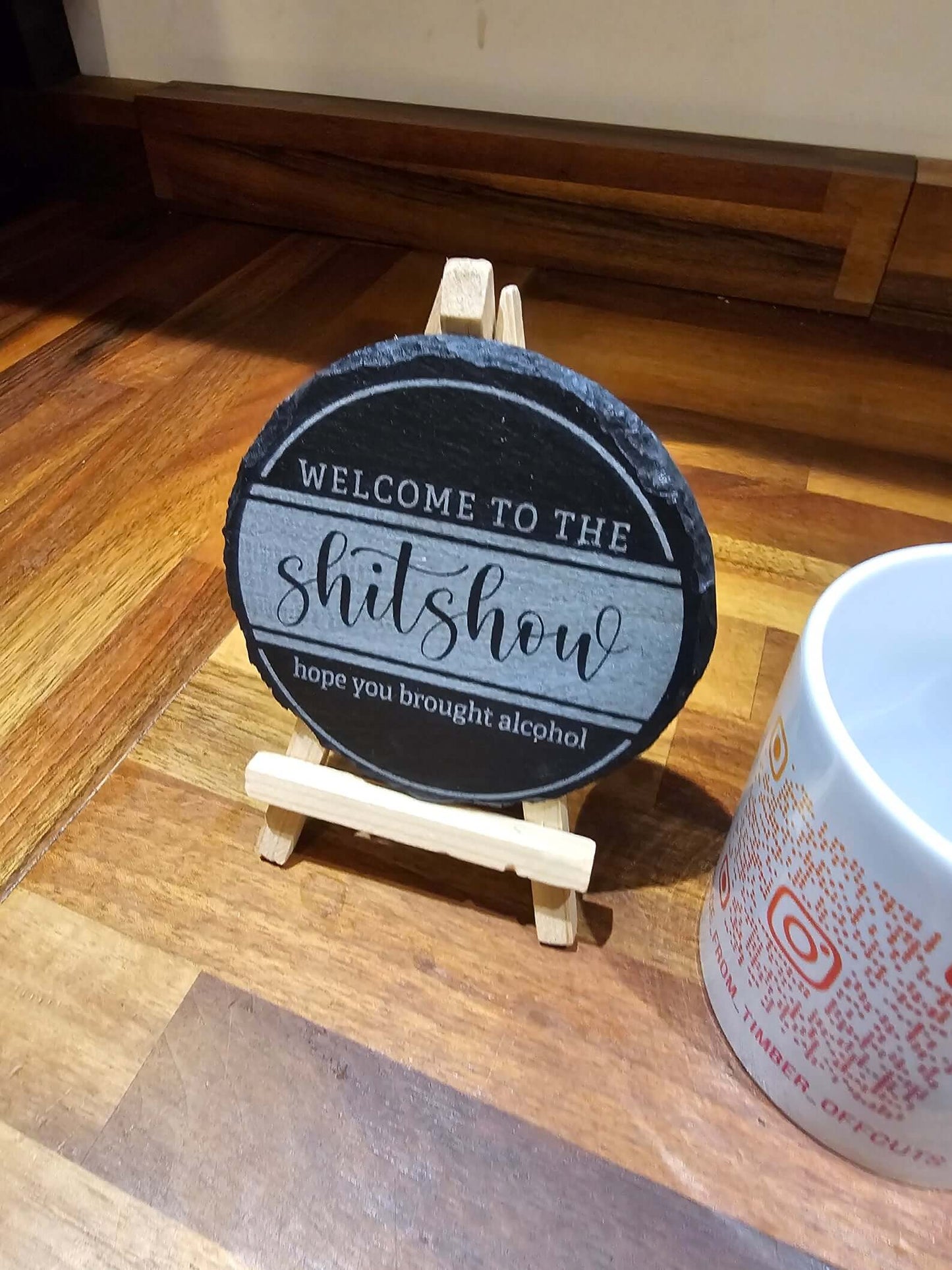 Slate Coasters Engraved design featuring humorous text 'Welcome to the Shitshow' on a natural slate coaster.