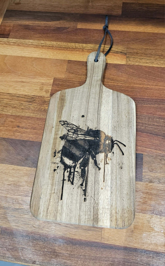 Handcrafted Engraved Bee Serving Board, beautifully crafted from natural wood, featuring a bee design.