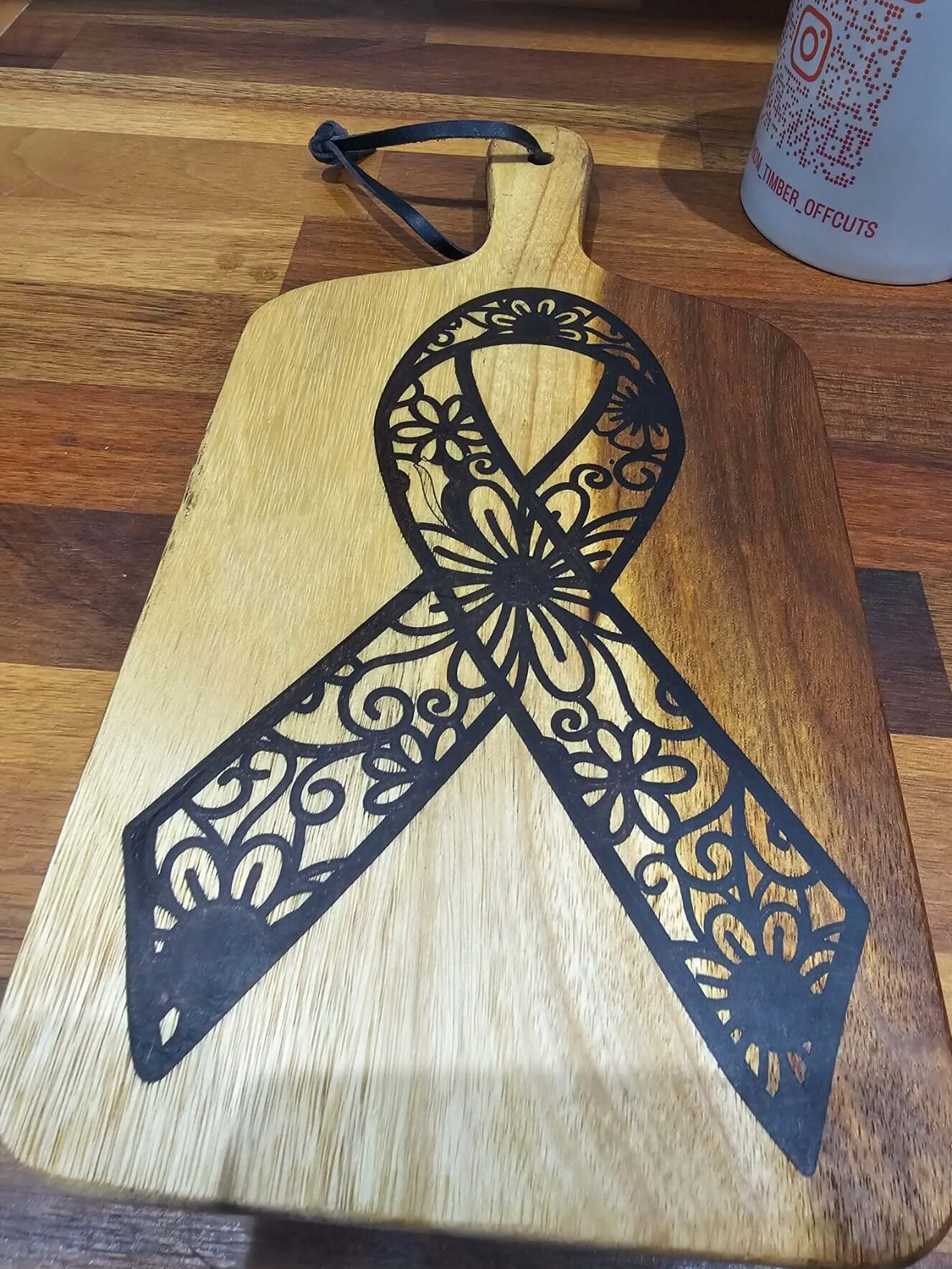 Floral Awareness Ribbon Engraved Wooden Serving Board showcasing intricate floral design, 28cm x 14cm.