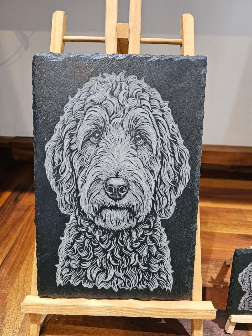 Personalised Dog Portrait Slate Plaque featuring an engraved detailed dog illustration on a slate background.