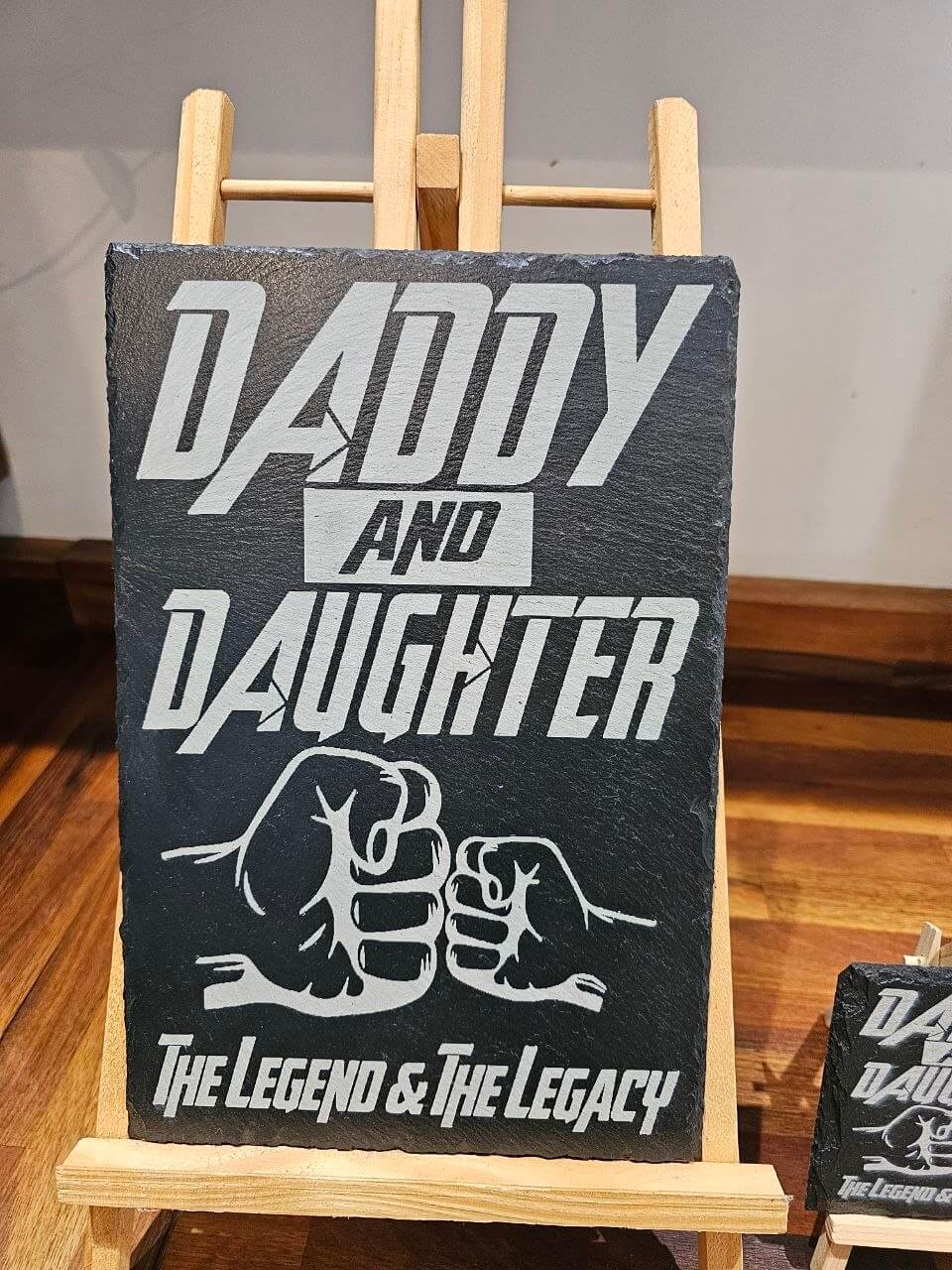 Slate plaque Dad displaying the phrase 'Daddy and Daughter – The Legend & The Legacy' on an easel.