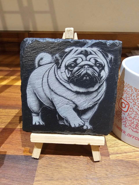 Pug edition Premium Custom Laser-Engraved Slate Coaster 10cm displayed on small easel.