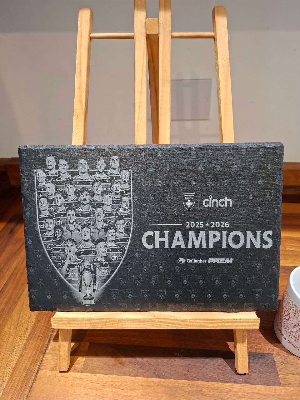 Northampton Saints Champions 2025 2026 Engraved Slate Plaque displayed on easel.